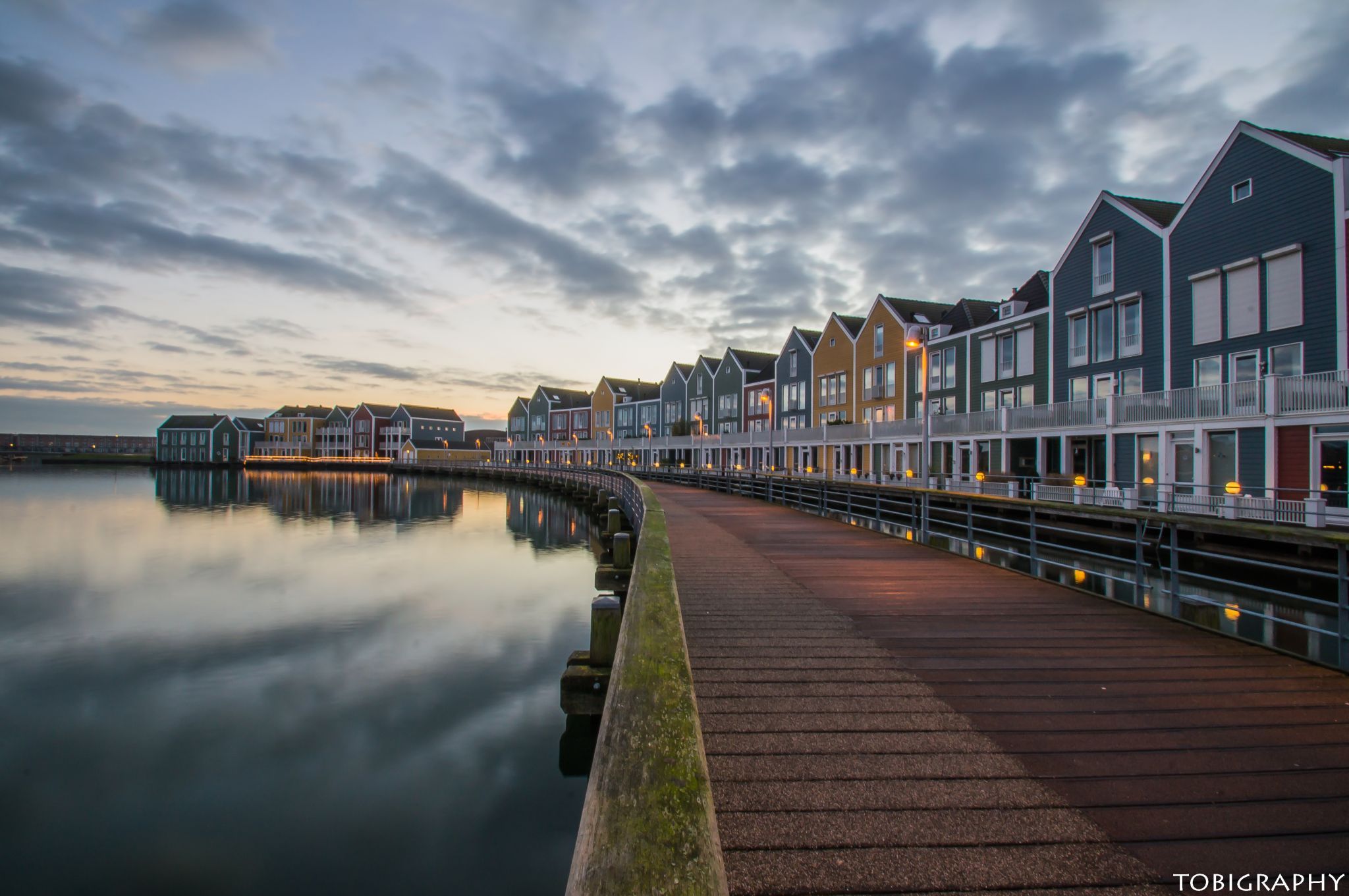 Rainbow colored houses on Rietplas, Houten, Netherlands