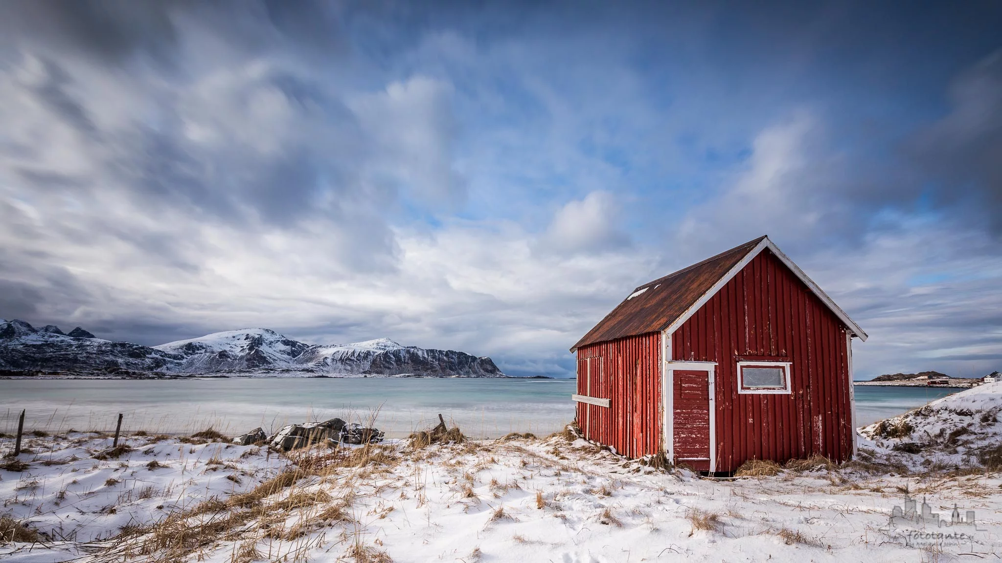 Red hut at Ramberg beach, Lofoten, Norway