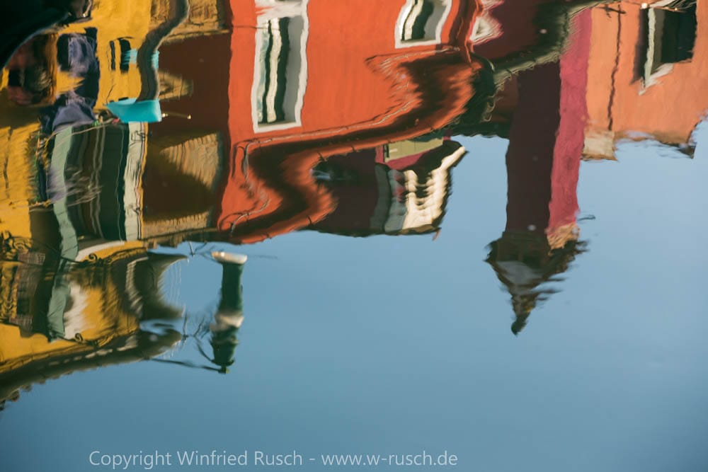 Water reflection in Burano, Italy