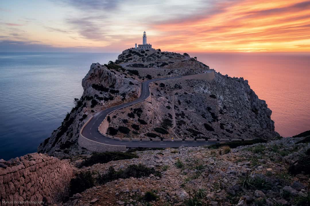 Cap Formentor is a great example of a spot that's perfect for sunrise photos. I even got pretty "lucky" with the clouds and colors, dividing the scene into 2 opposite colors with the warm colors on the right and the cooler blue colors on the left side of the lighthouse.