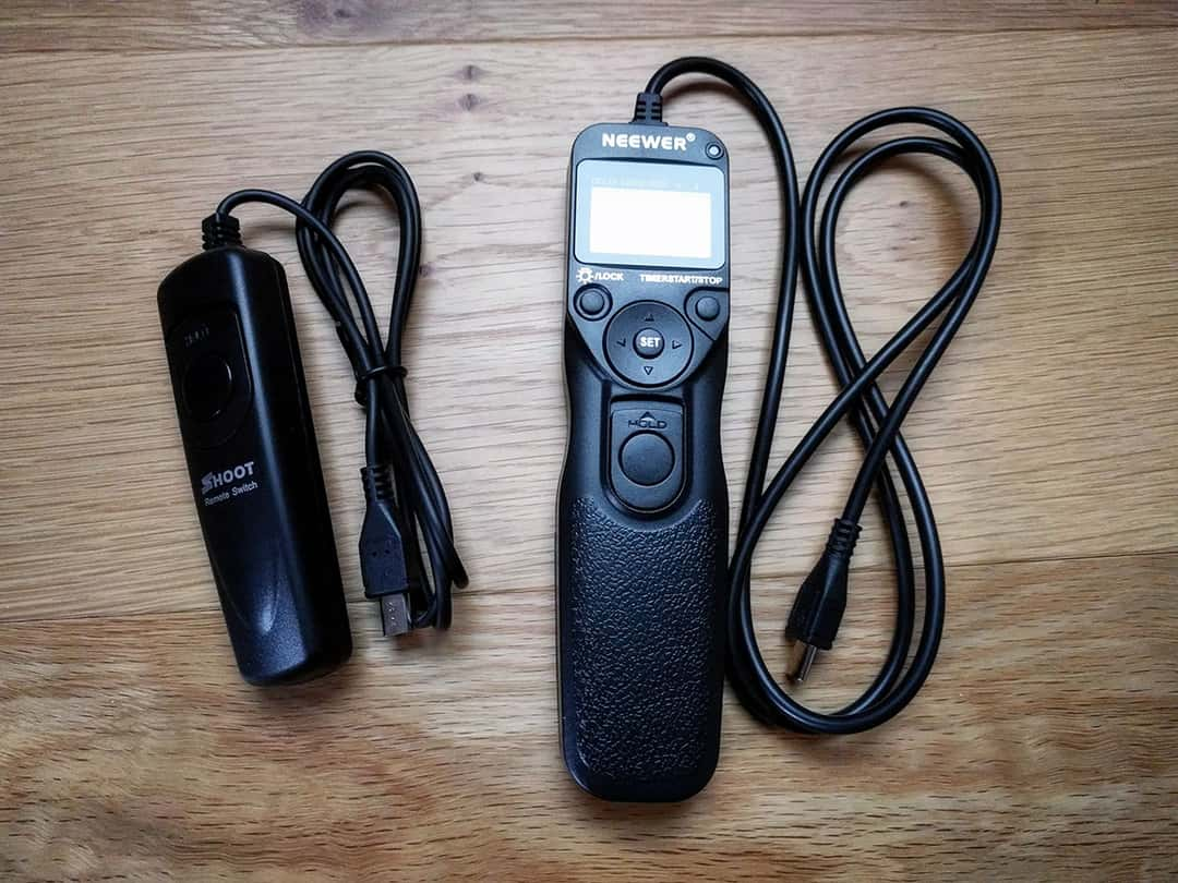 Two cheap remotes, one with a timer and lots of different settings and one without. From my experience it's also a good idea to always have 2 in your backpack, especially in countries like Iceland where the rain and weather easily can break them.