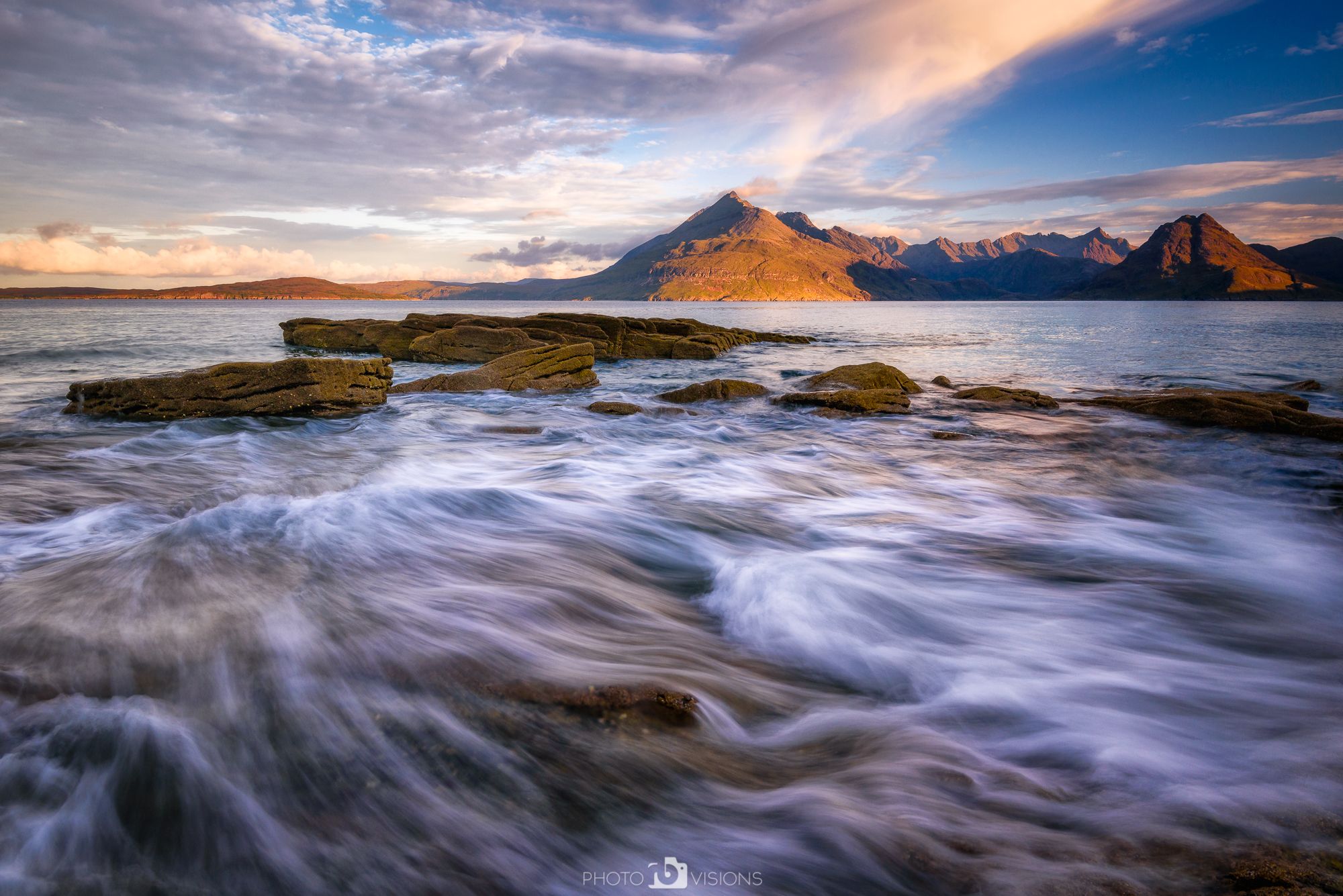 View of Soay Island mountain cheapest range from rocky sand beach in Elgol Village, Scotland