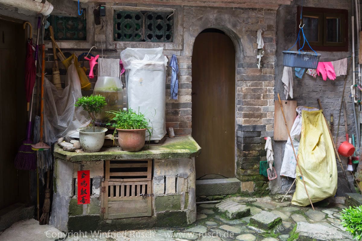 Wohnen in einem Tulou Haus, China