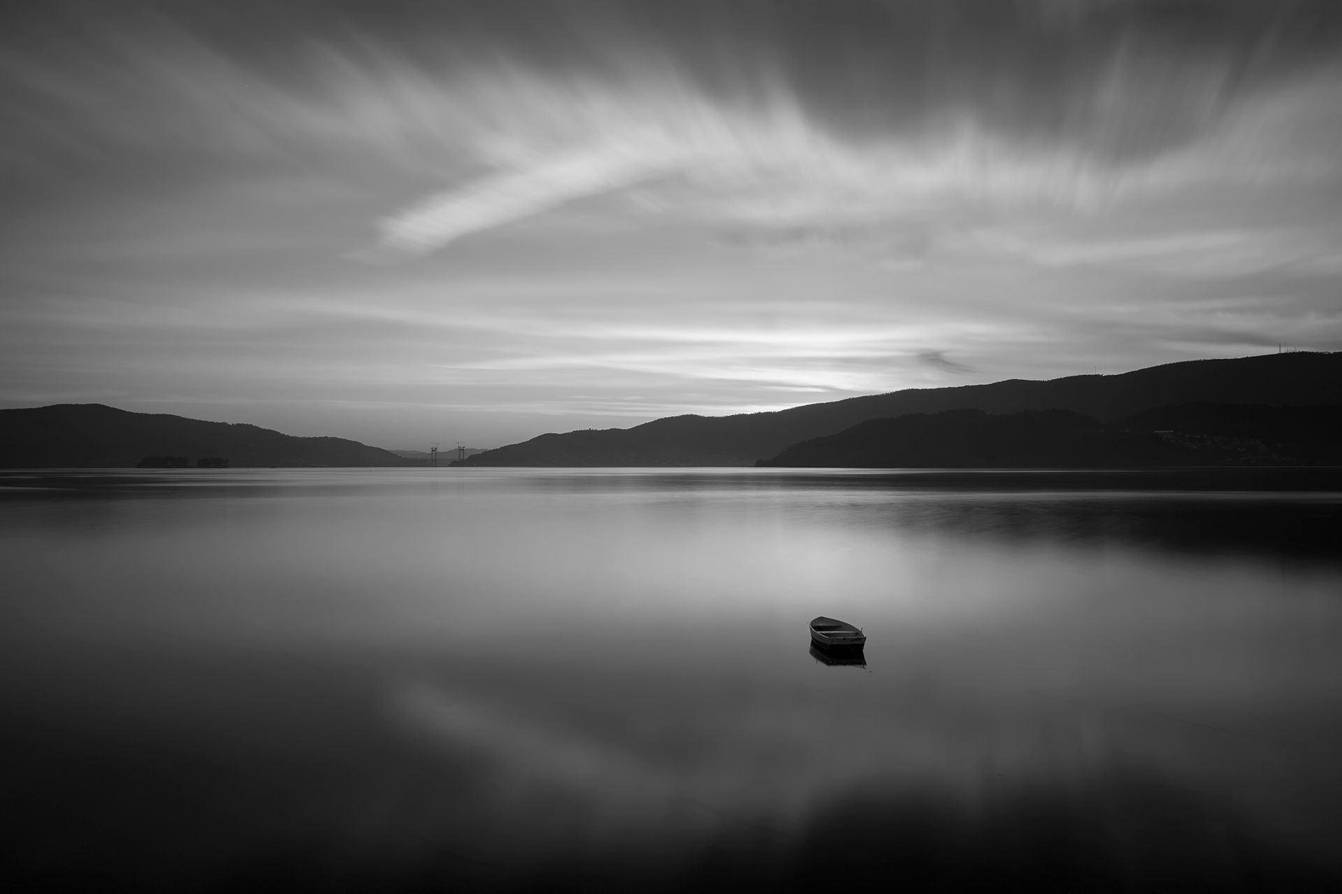 Sunset with small boat, Spain