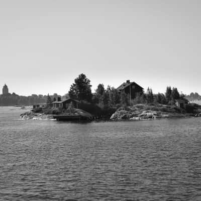 Wood house on small island, bay of Helsinki, Finland