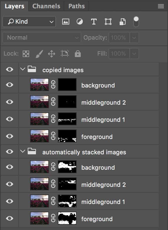 This is how your layers could look like when you've duplicated them before stacking. I added the black masks manually to the copied image layers and I am now able to paint in the layer that I need without changing the masks, that were automatically generated by Photoshop.