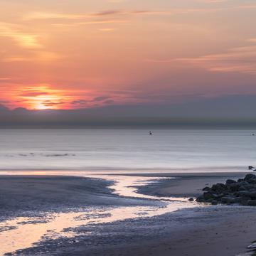 Sunset Belgian coast at low tide, Belgium
