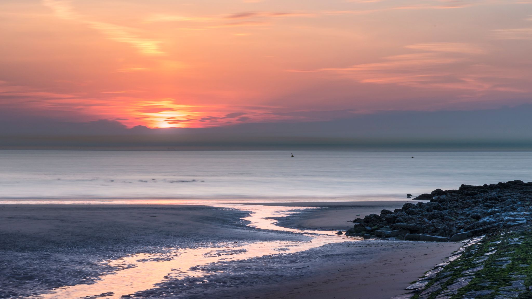 Sunset Belgian coast at low tide, Belgium