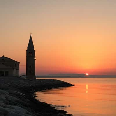 Caorle Lighthouse and Ciesa Madonna dell'Angelo, Italy