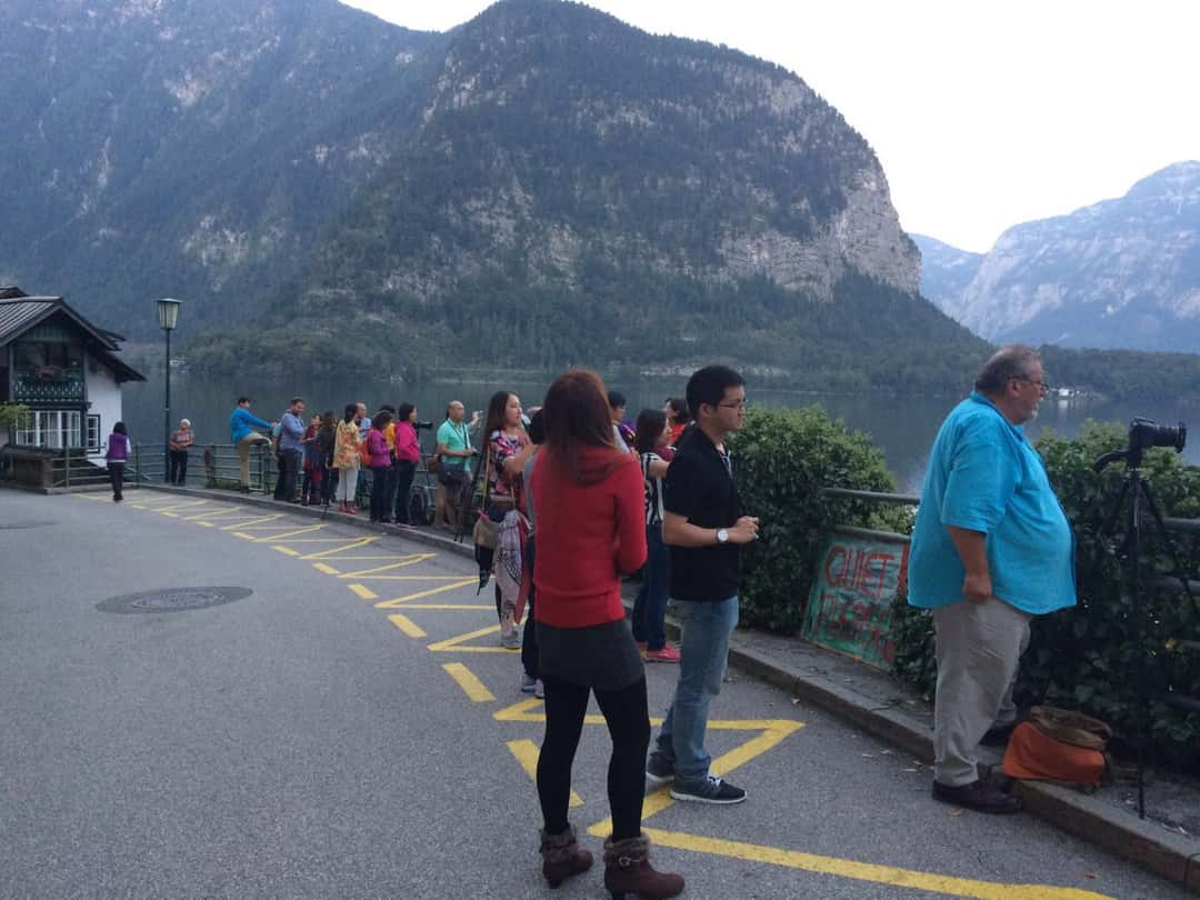 This is how the spot itself for the famous view towards Hallstatt in Austria looks like. There are usually a lot of people, that want to get the same photo during sunset too. While there is definitely enough space for everyone, a lovely lady always held her phone in front of my lens, because she was anything else than fine with me standing next to her.