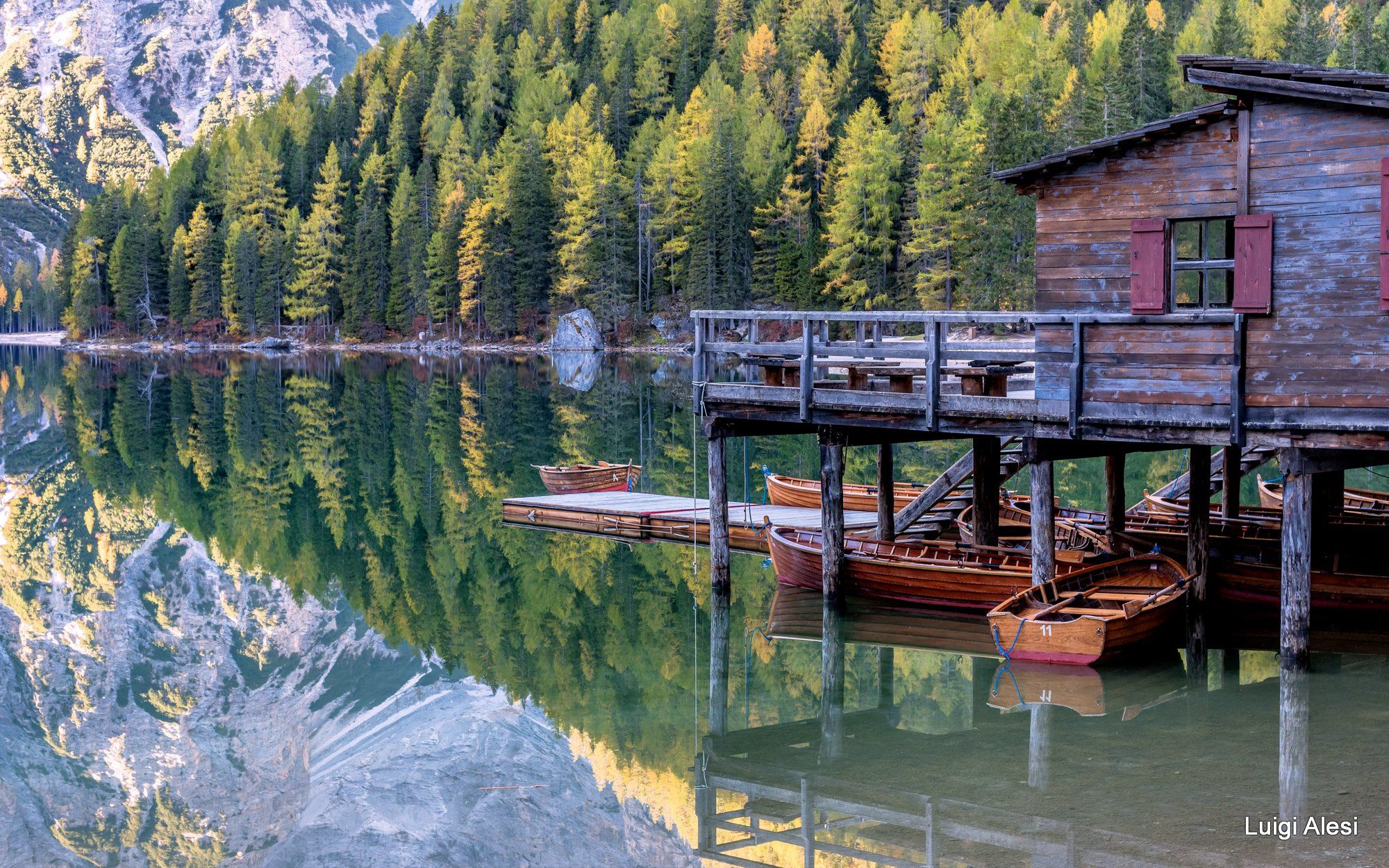 Wooden house on Lago Braies in Dolomites, Italy