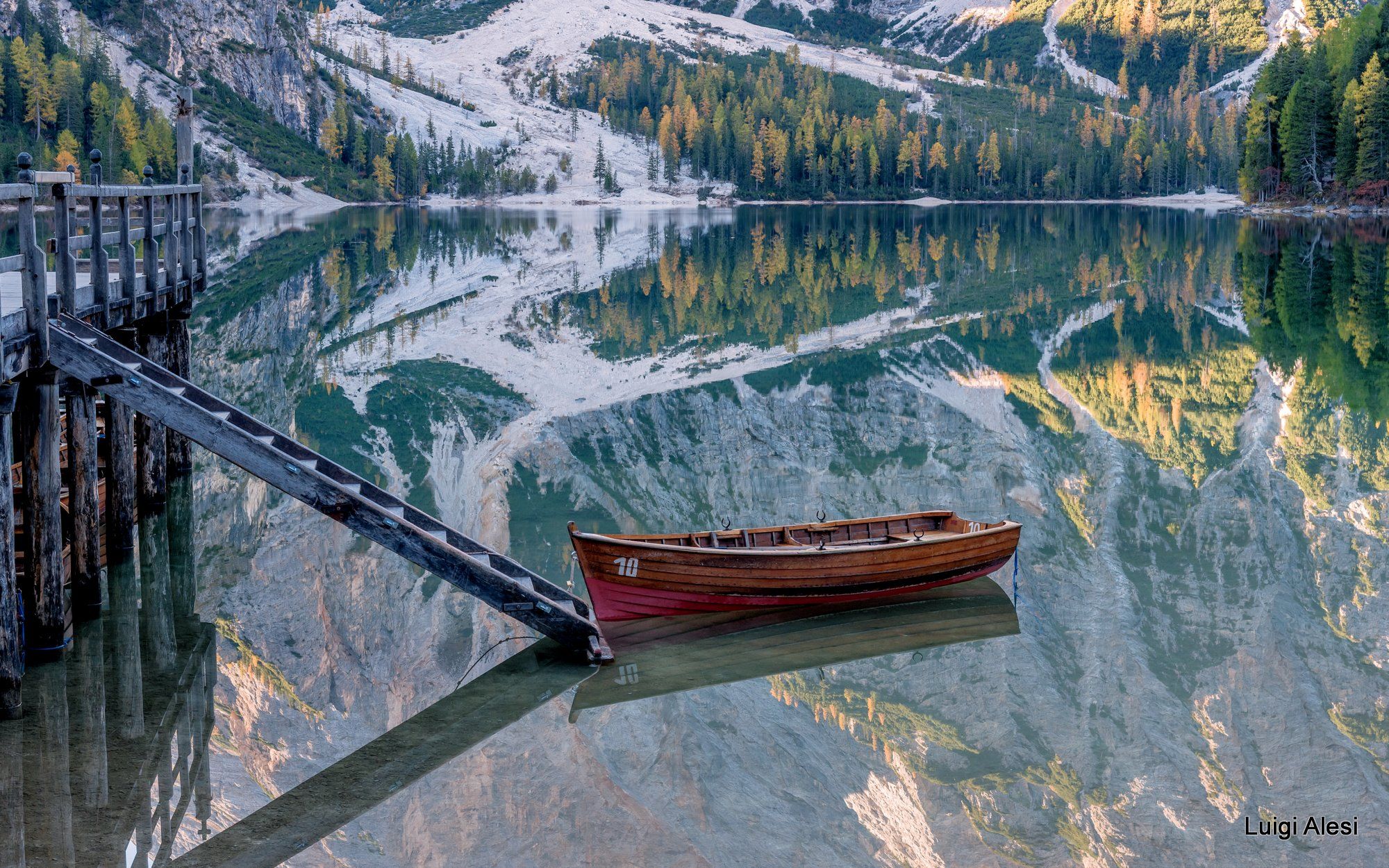 Wooden house on Lago Braies in Dolomites, Italy