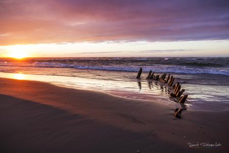 Beach of Hirtshals with a little shipwreck
