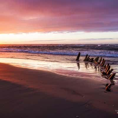 Beach of Hirtshals with a little shipwreck, Denmark