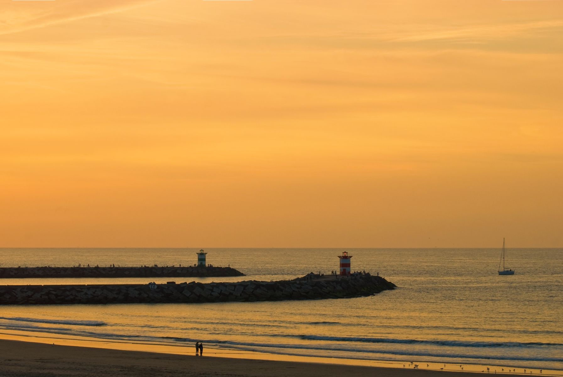 Scheveningen beach with view on the harbour, Netherlands
