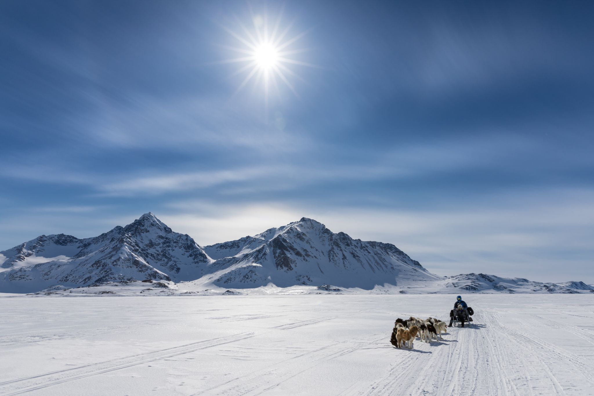 Travelling on the frozen sea ice of East Greenland, Greenland