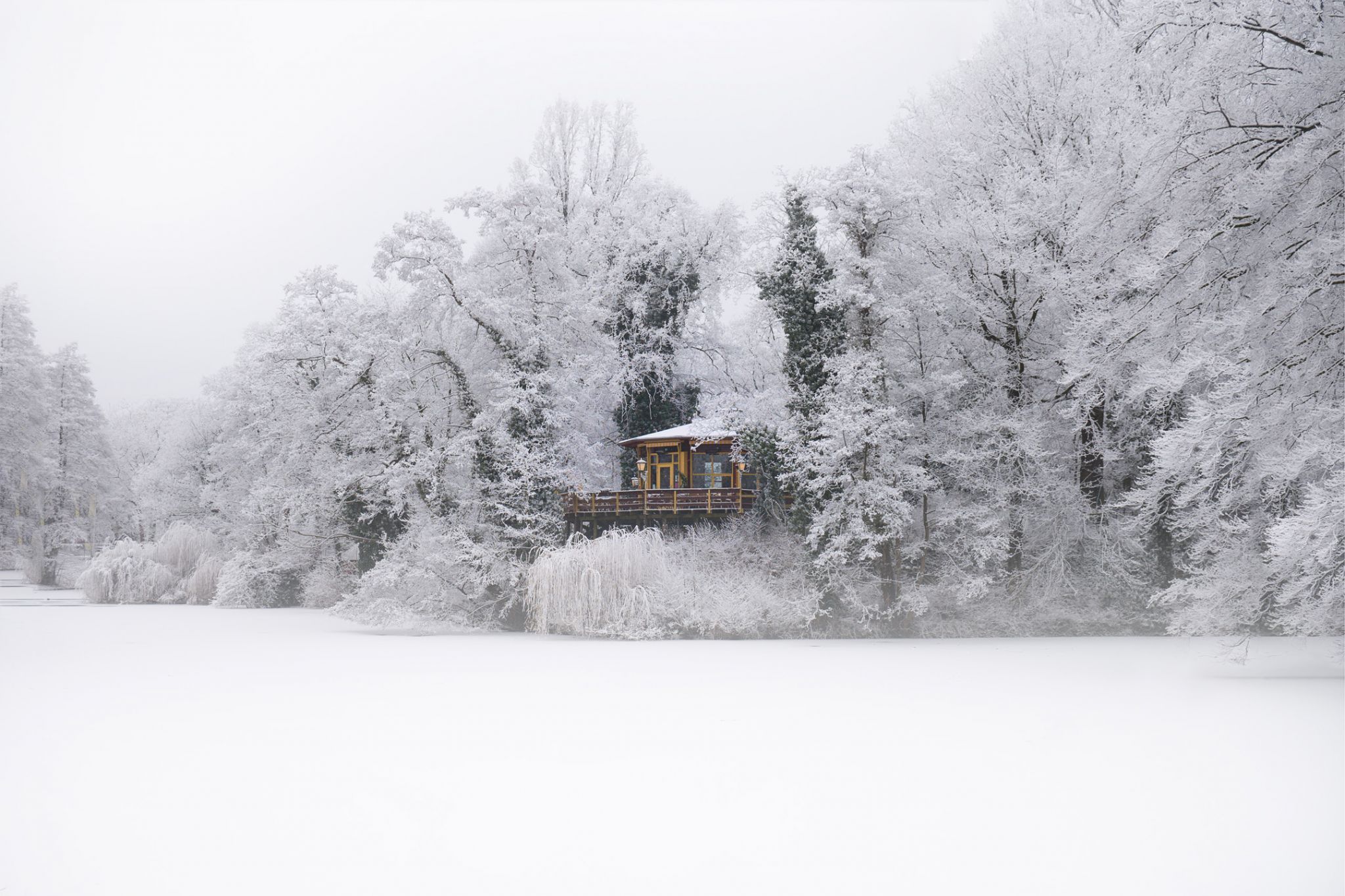 Restaurant The Pavilion on Bird Island during winter snow, Netherlands