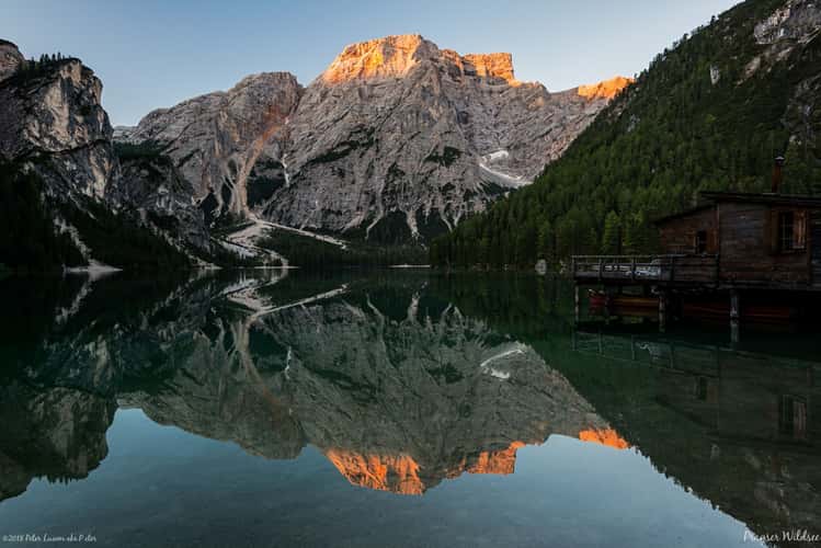 Wooden house on Lago Braies in Dolomites