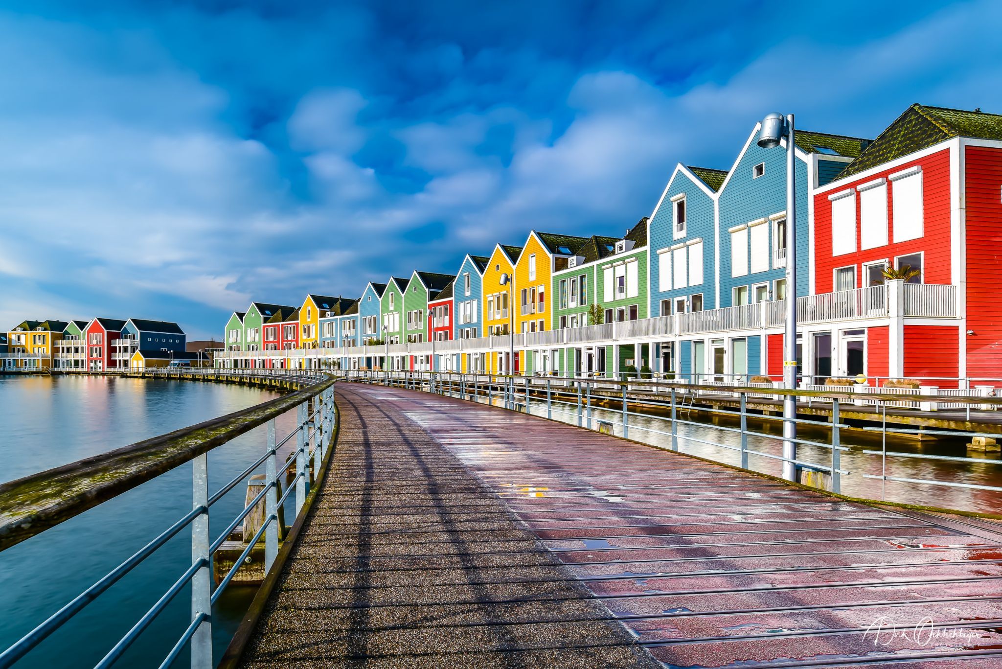 Rainbow colored houses on Rietplas, Houten, Netherlands