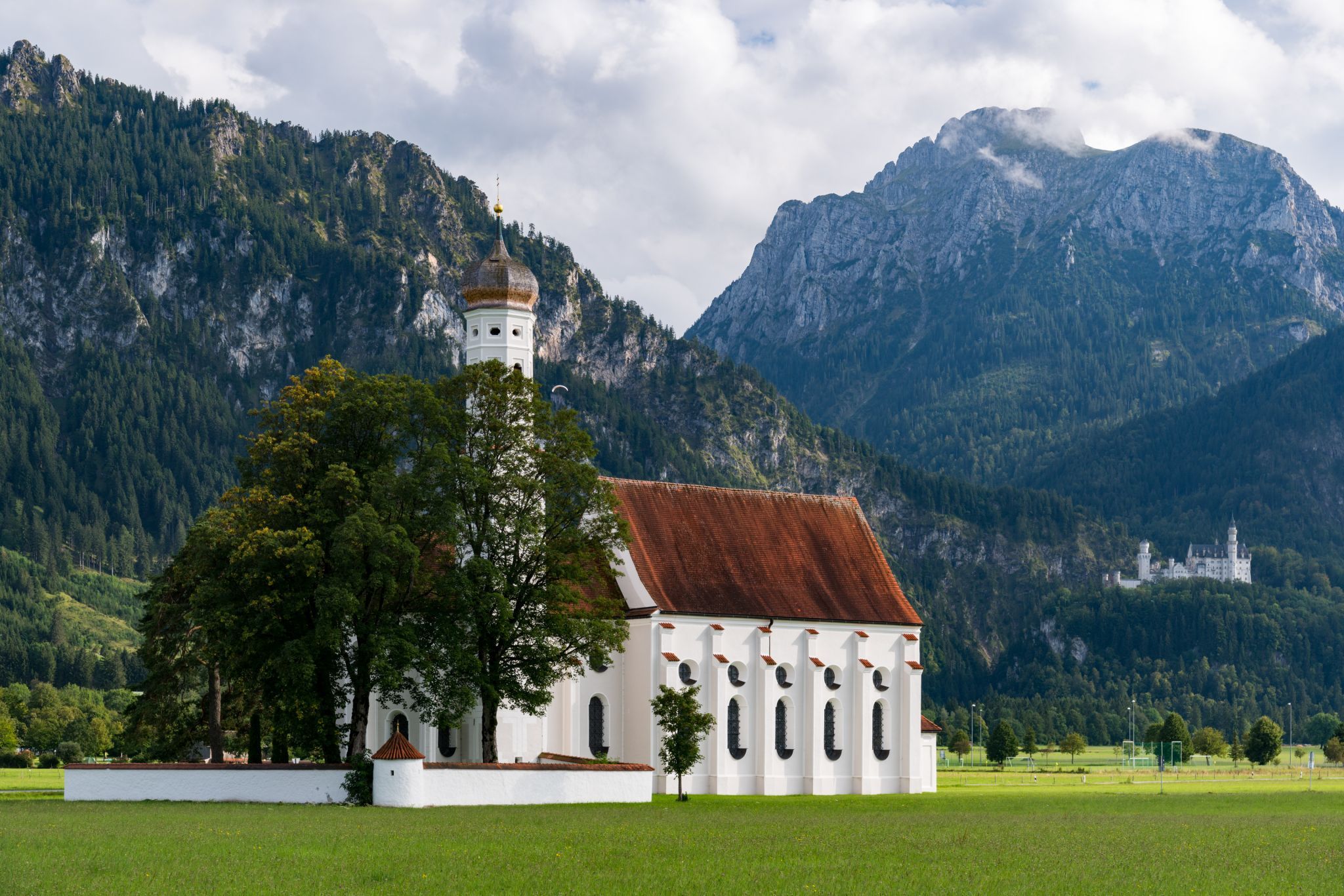 St. Coloman Church with Neuschwanstein, Bavaria, Germany