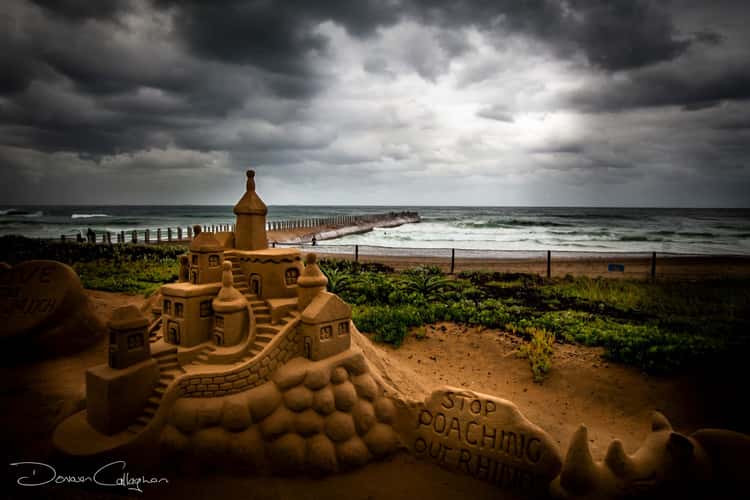 Stormy Durban beach with sand Castle
