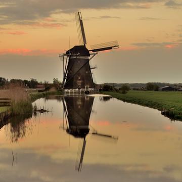Sunset on Driemanspolder Windmills in Stompwijk, Netherlands