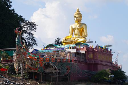 Golden Buddha on the Mekong River