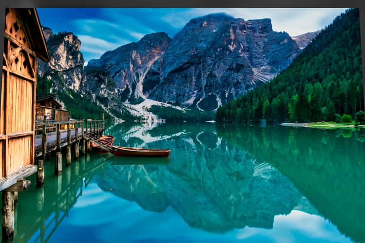 Wooden house on Lago Braies in Dolomites