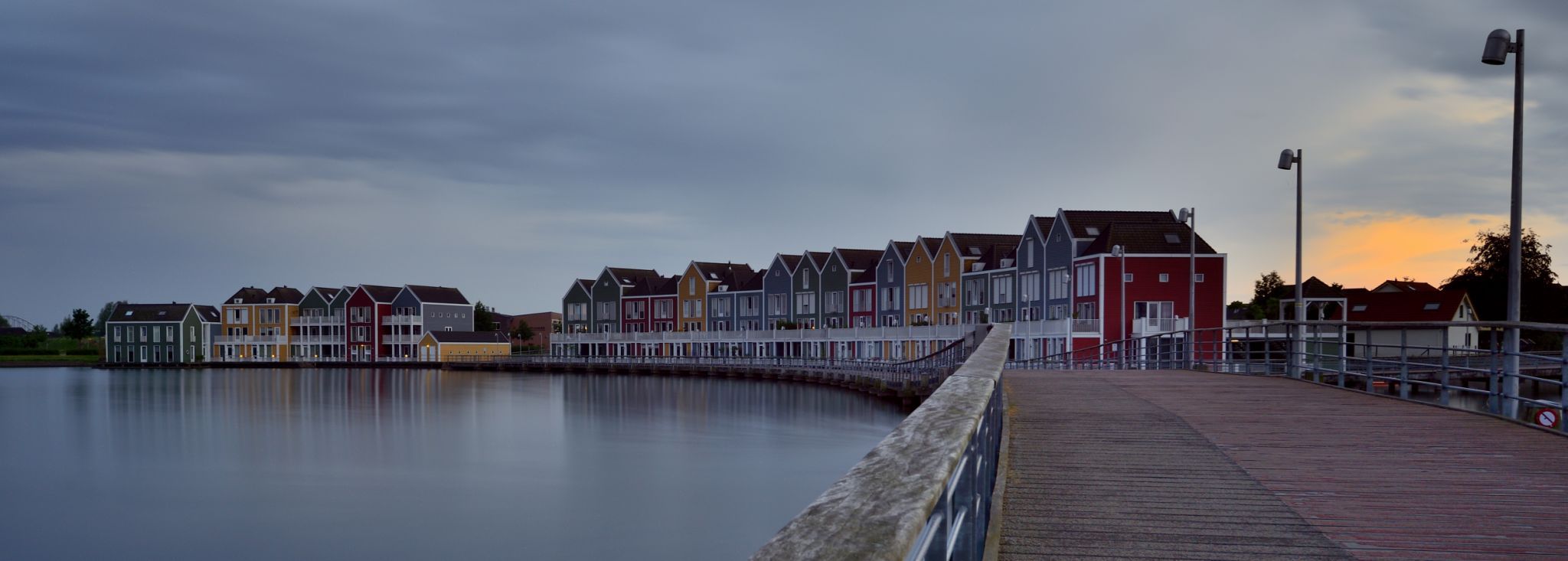 Rainbow colored houses on Rietplas, Houten, Netherlands