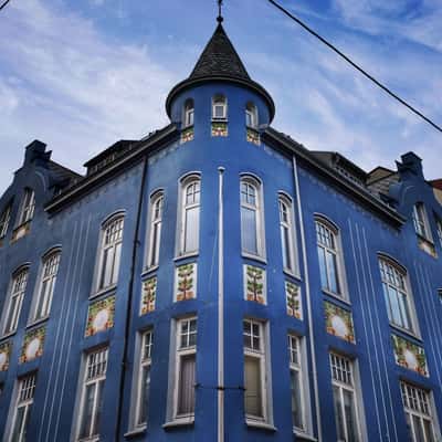 Blue art nouveau building in downtown Ålesund, Norway