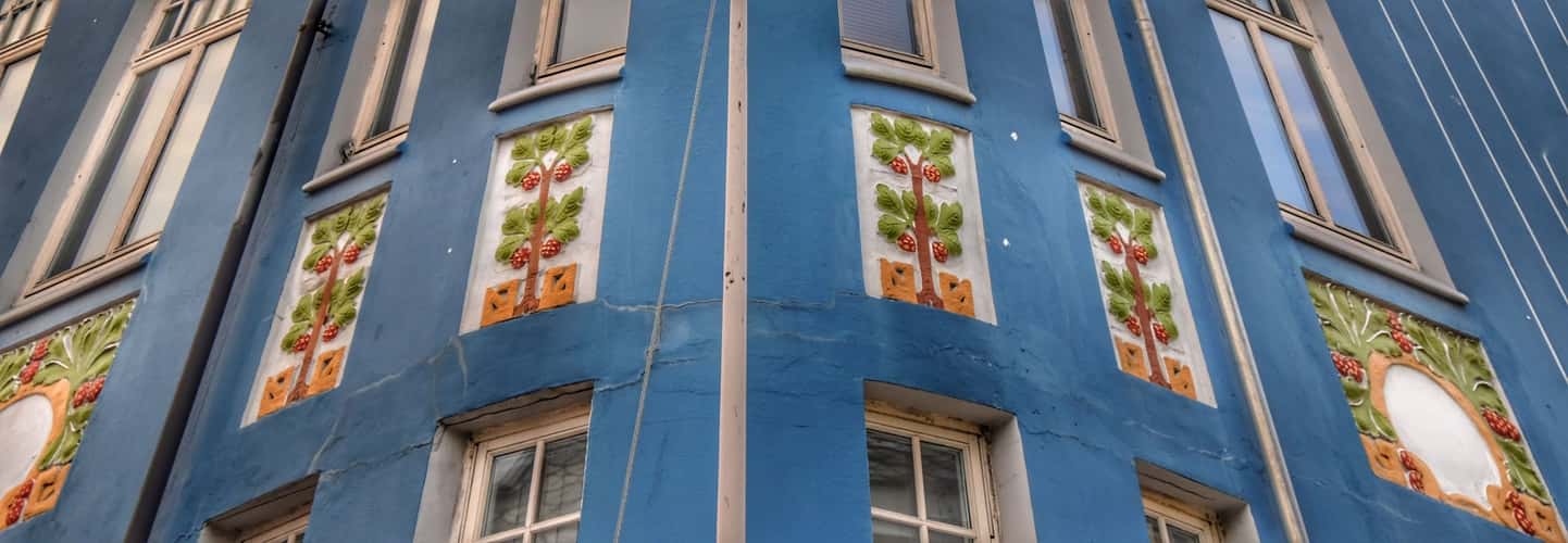 Blue art nouveau building in downtown Ålesund