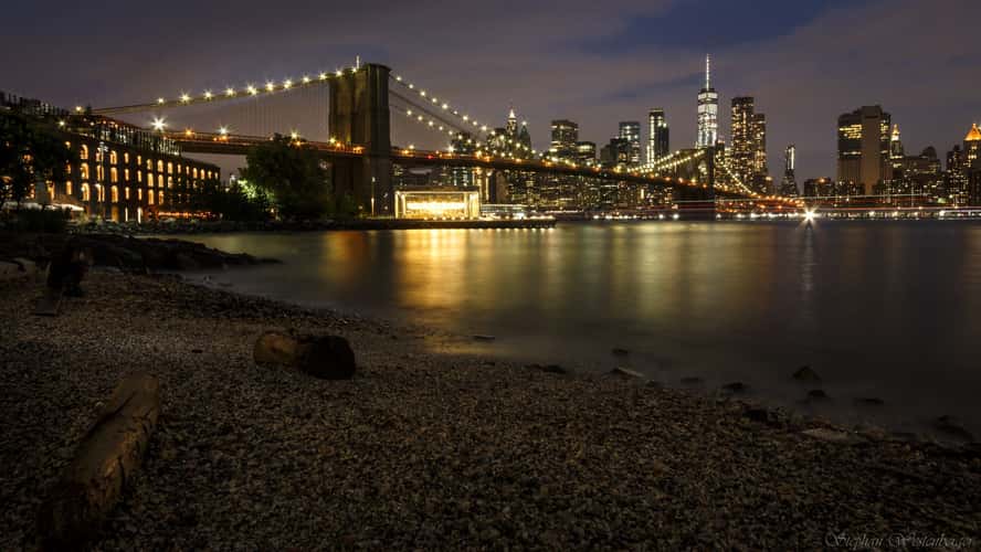 Brooklyn Bridge skyline from Pebble Beach, New York City