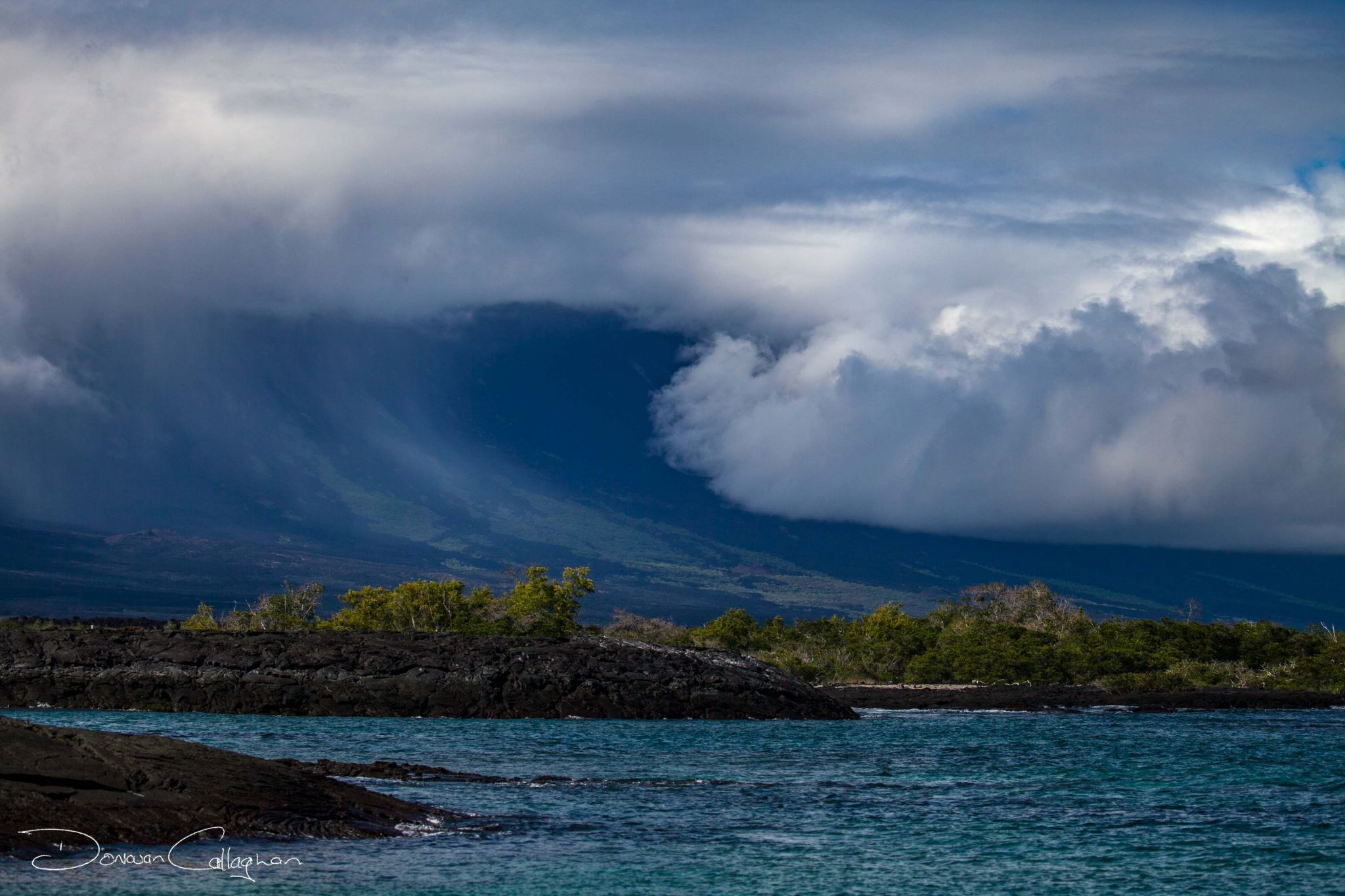 Cloud Rolling down the mountain Galapagos Islands, Ecuador