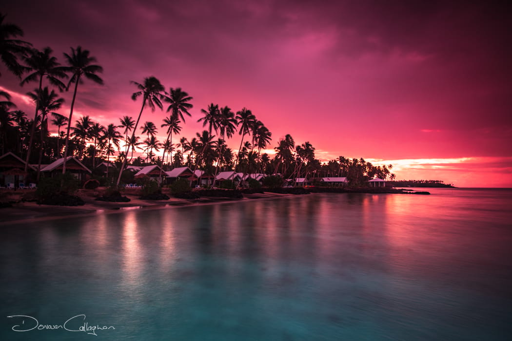 Sunrise coconut palms Samoa, Samoa
