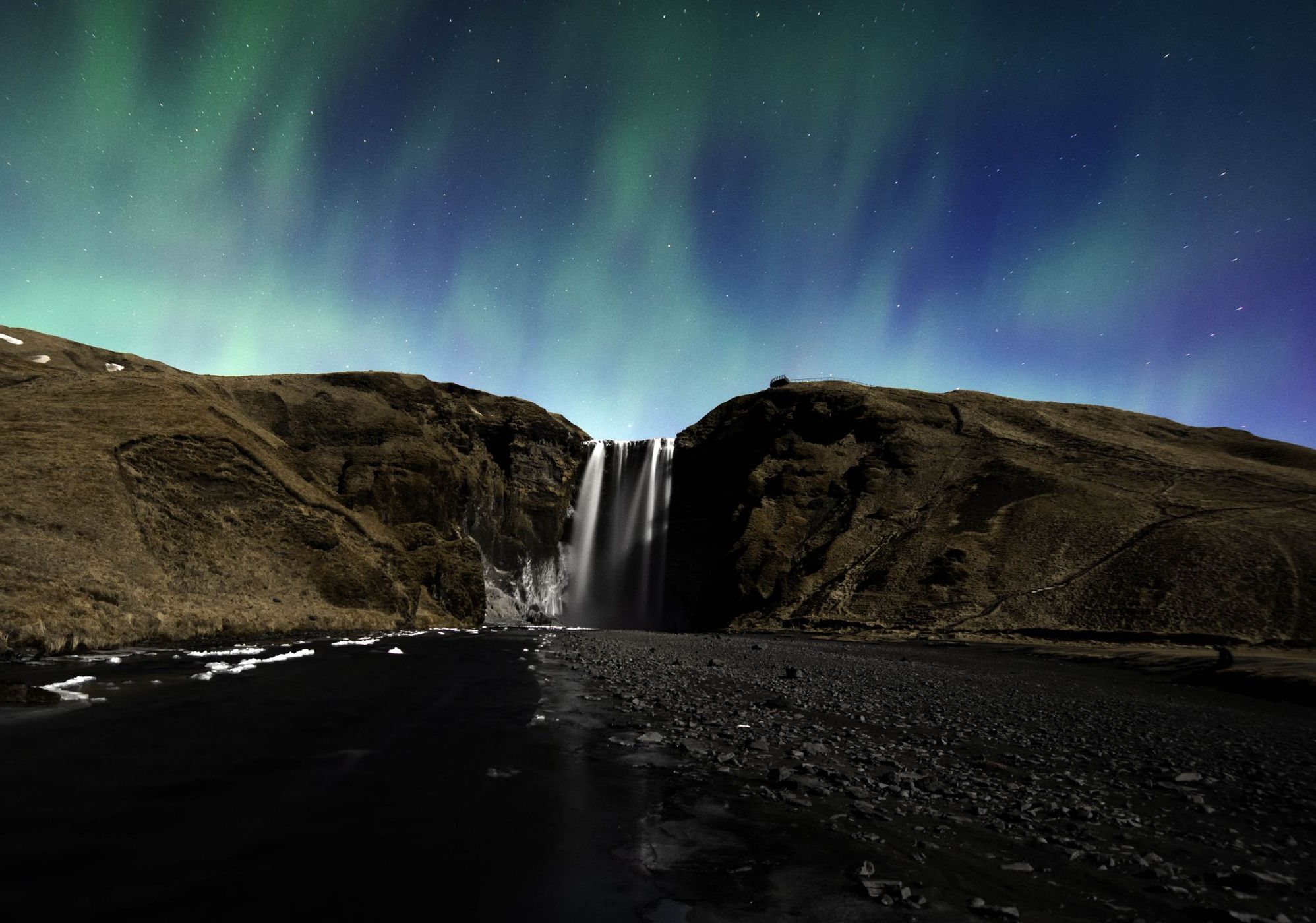 Skogafoss waterfall at night, Iceland