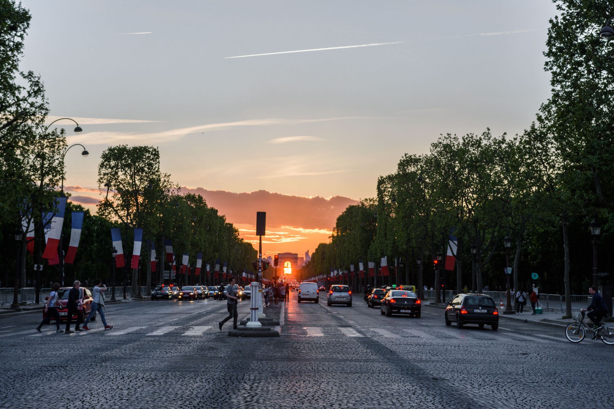 Sunset behind Arc de Triomphe, France