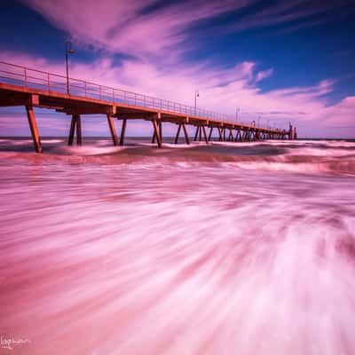 Glenelg Pier with frothy water Adelaide, Australia