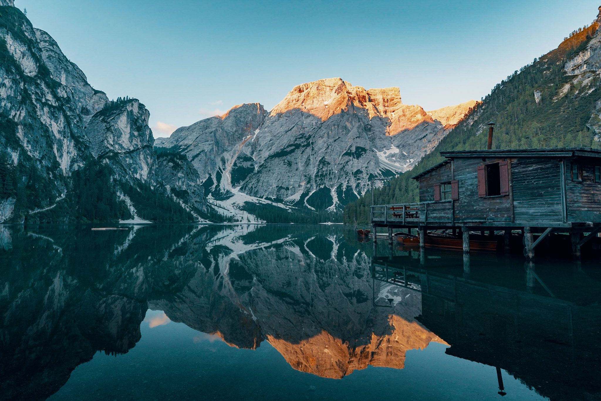 Wooden house on Lago Braies in Dolomites, Italy