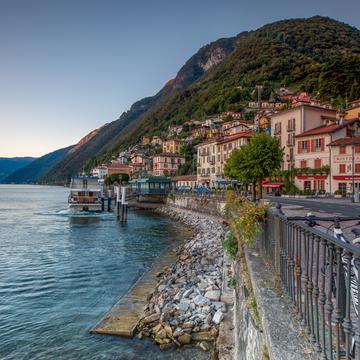Argegno Ferry leaving the wharf Lake Como, Italy