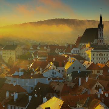 Overlook of city at sunrise, Czech Republic