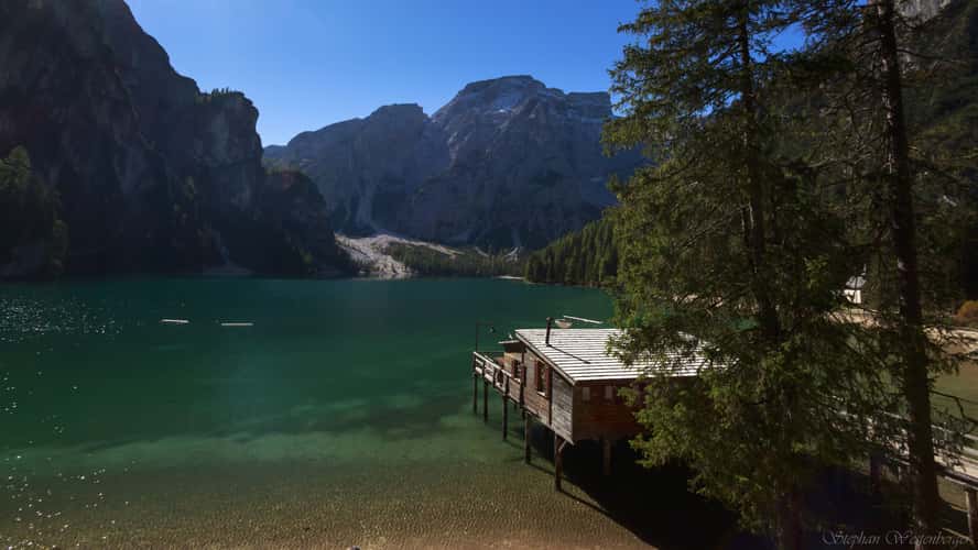 Wooden house on Lago Braies in Dolomites