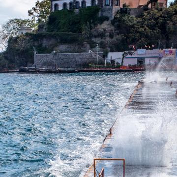 Lipari Castle waterfront spray, Italy