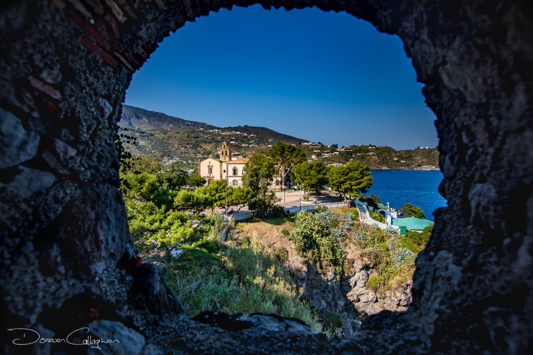 Lipari looking through the hole at the Castle, Italy