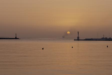 Tinos harbour at sunset