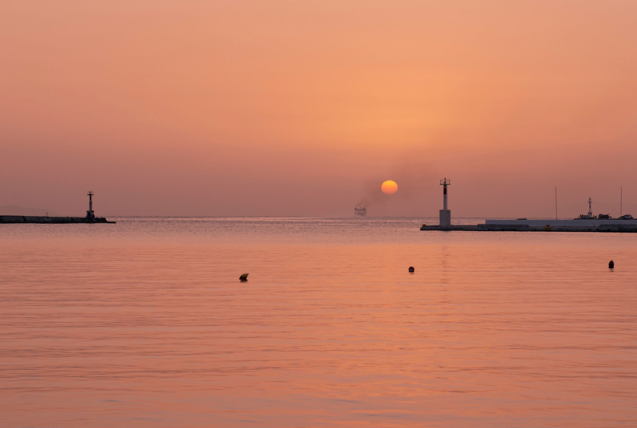 Tinos harbour at sunset, Greece