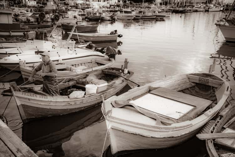 Fisherman Palermo harbour B&W Sicily
