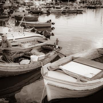 Fisherman Palermo harbour B&W Sicily, Italy