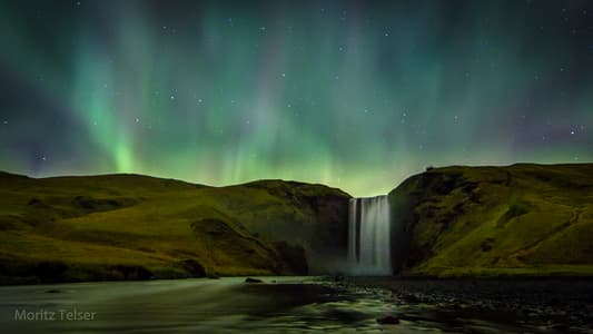 Skogafoss waterfall at night