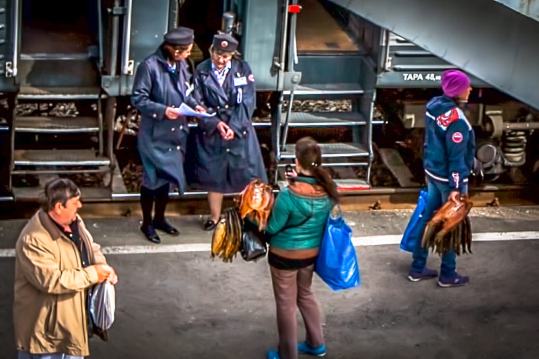 Trans Siberian Railway fish sales people, Russian Federation