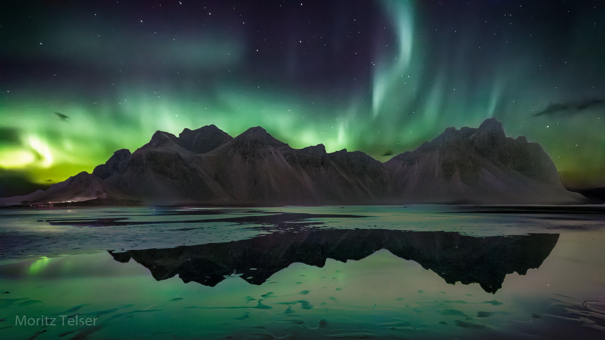 Northern Lights over Vestrahorn Mountain from Stokksnes, Iceland